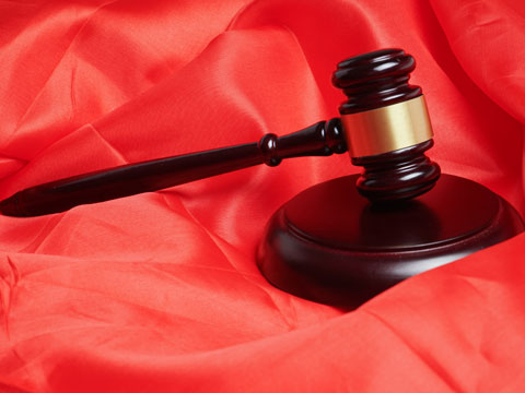 公司因?qū)嵲跊]有能力支付工人工資會判刑嗎